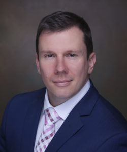 A man in a suit and tie.